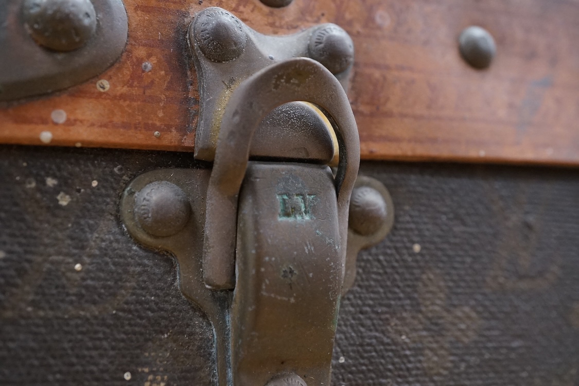 A vintage Louis Vuitton monogram suitcase with two original keys, numbered 793692 to the linen covered interior, height 22cm, width 76cm, depth 46cm